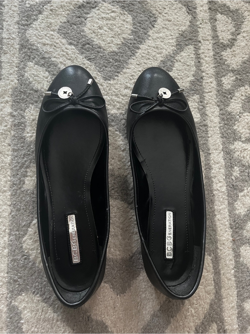 BCBGeneration Black Bow Ballet Flats with Silver Accent
